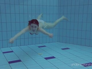 White swimsuit with tattoos – honey Roxalana Cheh underwater