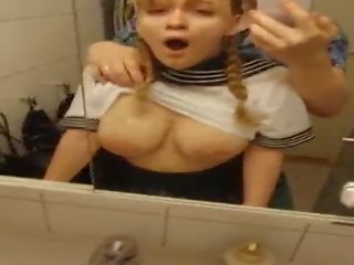 Busty darling getting fucked in bathroom